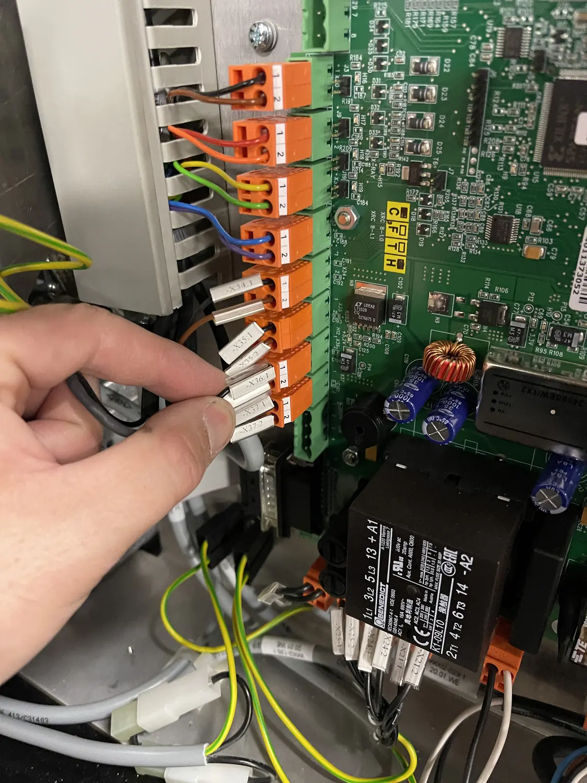 Close-up electronics fault-finding on screening equipment