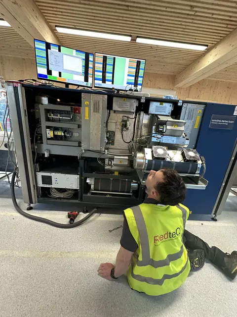 RedteQ engineer servicing an X-ray machine