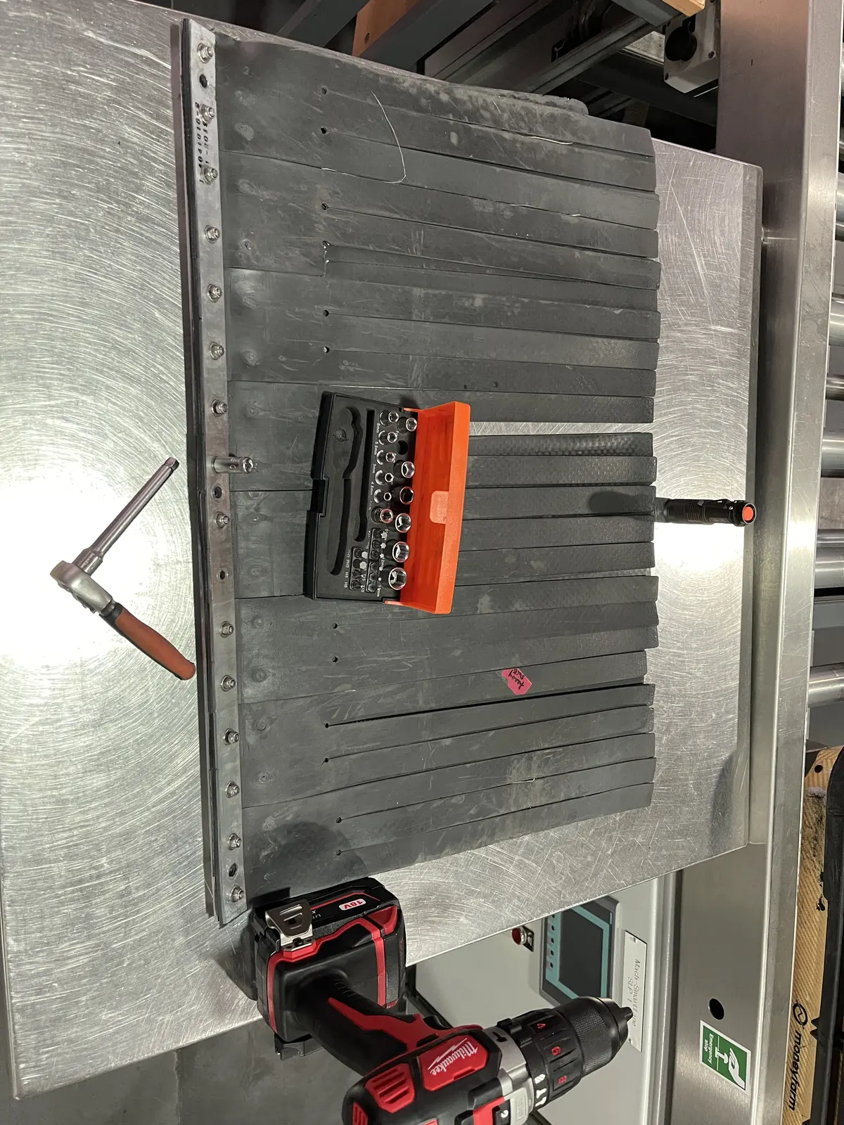 Replacing lead curtains on an X-ray machine