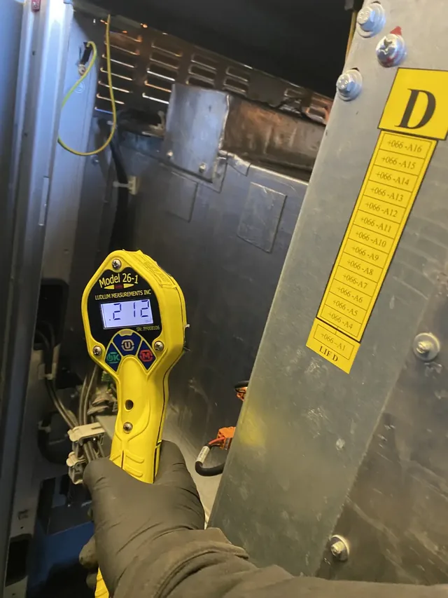 Radiation survey being carried out on an X-ray machine