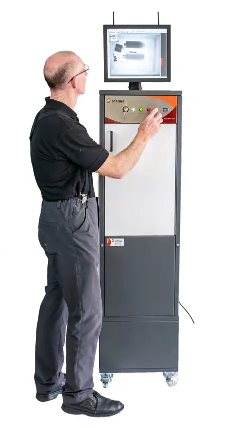 Scanna Scanmax 225 cabinet X-ray being operated for mail screening