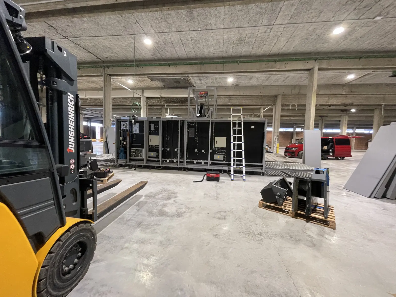 Forklift positioning screening equipment in a warehouse